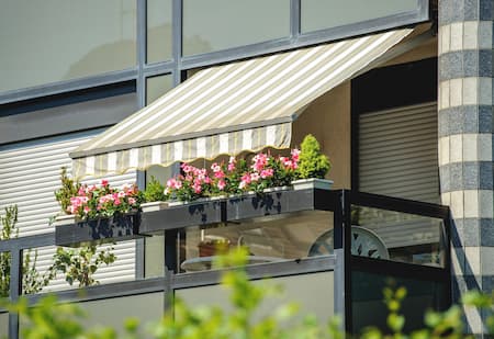 How Awning Cleaning Extends the Life of Your Outdoor Shades